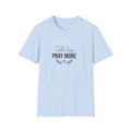 Light blue t-shirt with 'Talk less, Pray more' text on a white background