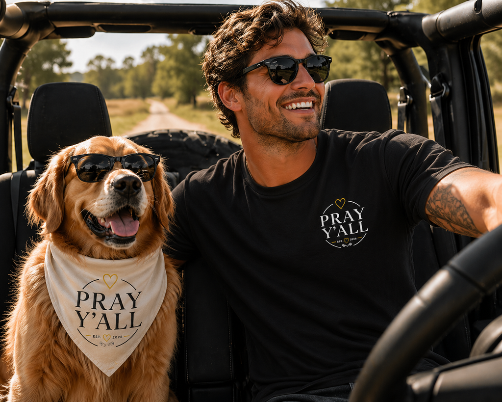 Man and dog wearing sunglasses with 'Pray Y'all' bandana in a vehicle